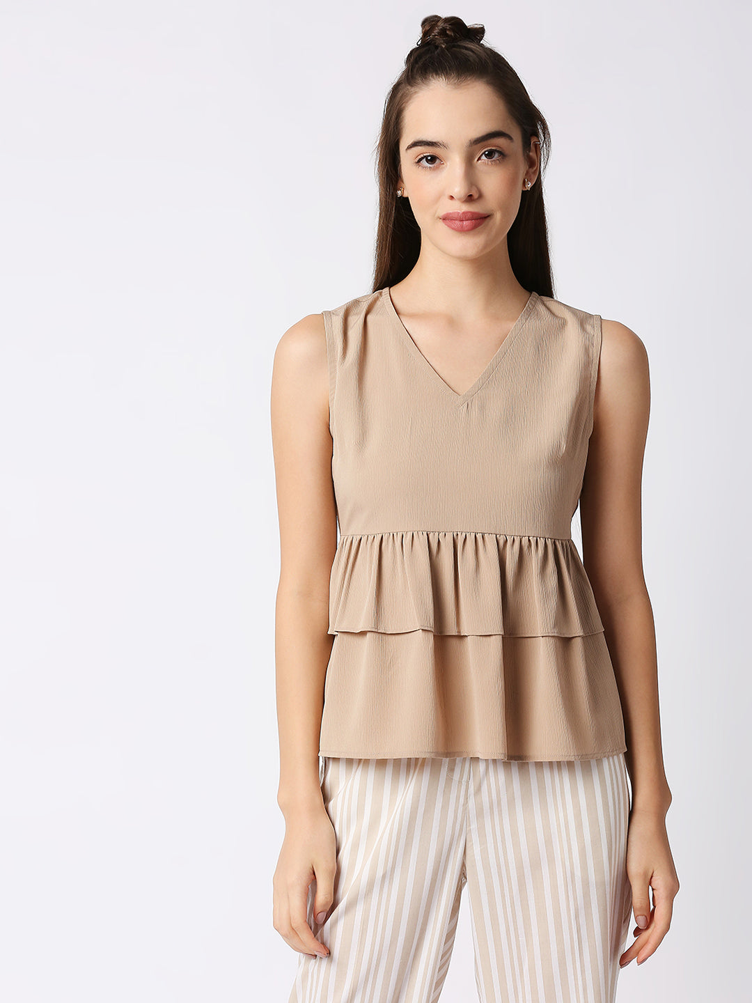 "Mantra sleeveless tier top"