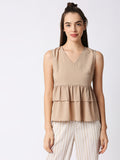 "Mantra sleeveless tier top"