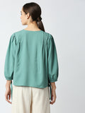 Mantra buttoned hem slit top
